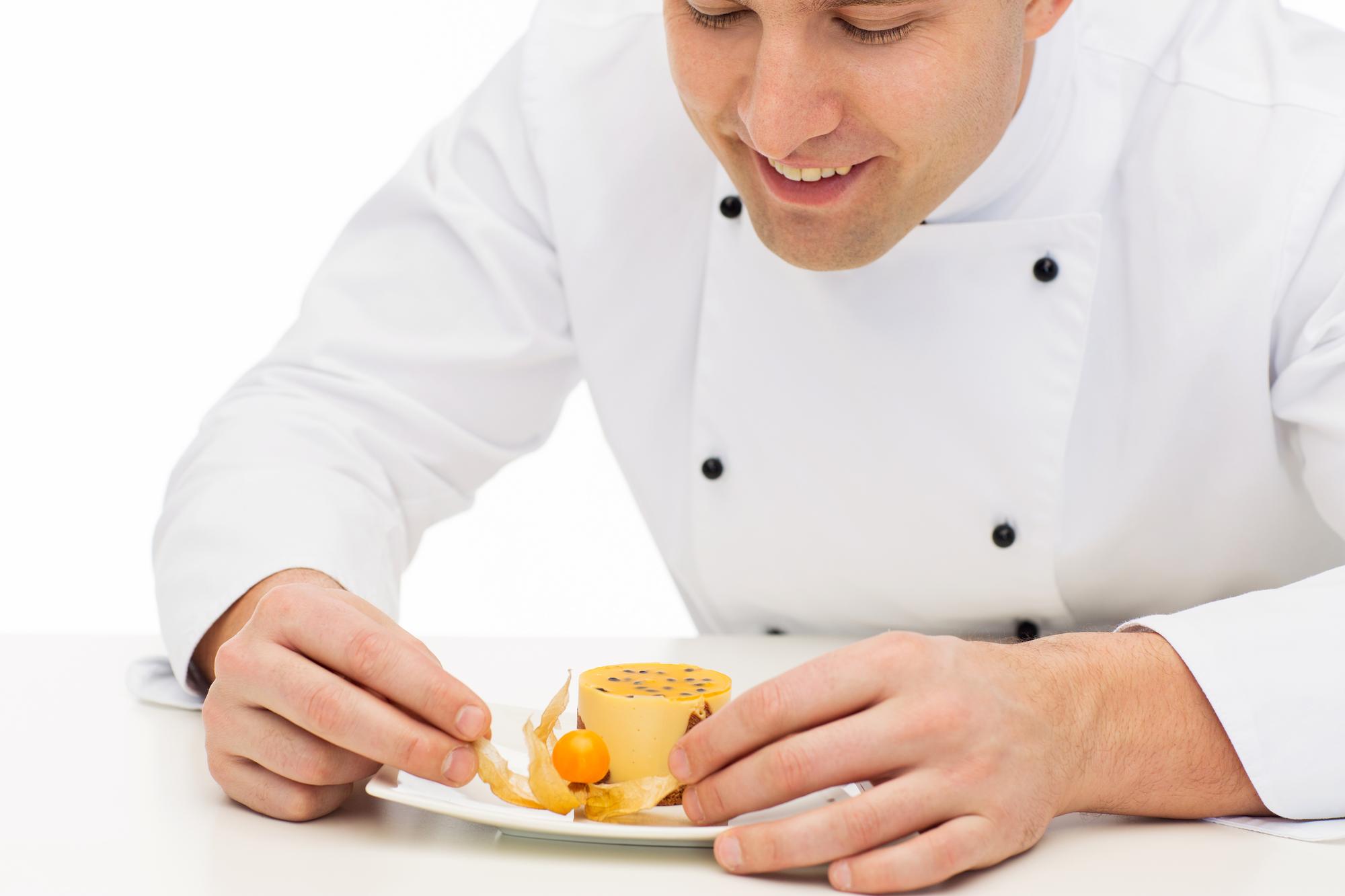 Student finishing a plated starter